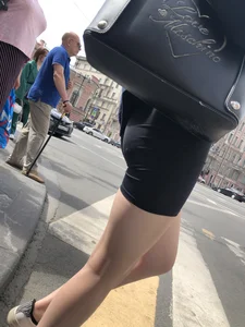 Great legs and booty in spandex shorts of a street candid girl crossing the street