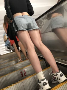 Tall Candid Teen Girl in Denim Shorts and a Top With an Injured Knee Subway and Street Creepshots - Hot and Muscular Long Legs