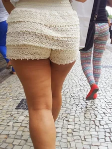 Big ass in shorts and ebony friend in leggings