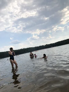 Girls in One-Piece Body Swimsuits Running Towards Water and Swimming - Beach Photo Gallery
