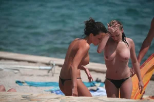 3 amazing topless girls on a nudist beach