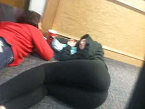 Teen Candid Girl in Leggings Lying on the Floor