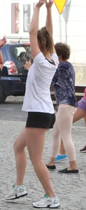 Girl Working Out on the City Street Candid Photos