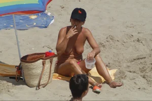 Girls on a nude beach in Sitges, Spain