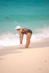 Bunch of sexy girls and milfs in bikinis at the beach