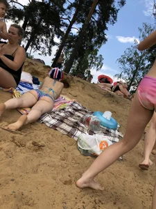 Girls in One-Piece Body Swimsuits Running Towards Water and Swimming - Beach Photo Gallery