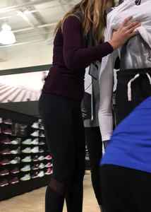 Dicks employee in tight leggings with an incredible ass