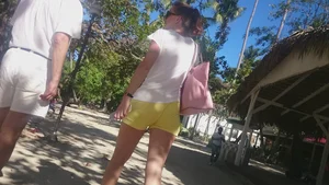 Milf in yellow shorts with vpl and a wedgie