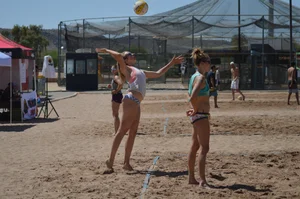 Beach volleyball blonde looking sexy and showing her body off