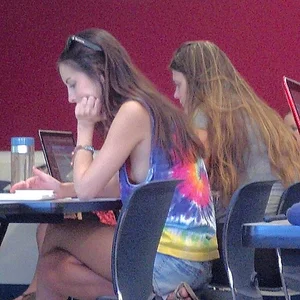 College girl in class showing sideboob with no bra on