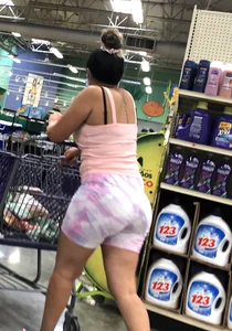 Thick Latina babe with a nice ass in tight patterned shorts