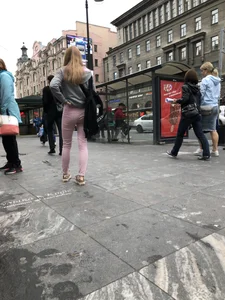Cute skinny blonde candid teen wearing tight pink jeans