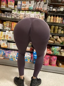 Fit milf doing big bends/squats
