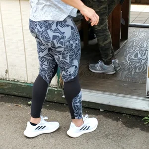 Girl with a nice ass in patterned leggings