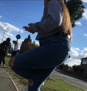 Long haired beauty teen with a tight ass in jeans