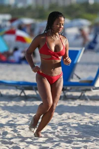 Christina Milian in red bikini in Miami with hard nipples