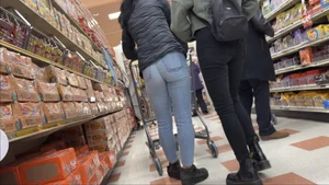 Sexy Asian girl grocery shopping in tight jeans with a nice ass
