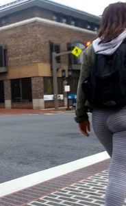 College girl in striped leggings walking with nice ass