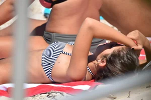 Sexy group of girls on the beach in various sizes