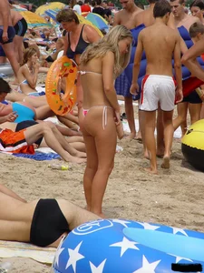 Beach voyeur girls in bikinis, thongs and topless