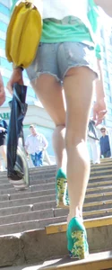 Girl on High Heels Walking Up the Stairs in Shorts - Perfect Legs
