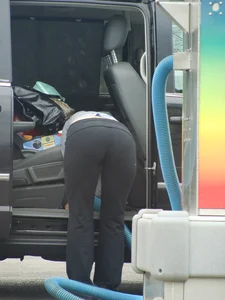 Girls cleaning their cars in jeans and pants