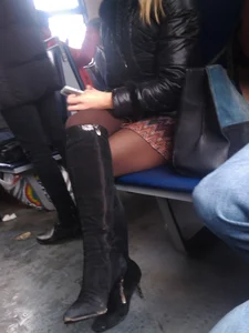 Crossed Candid Legs in a Bus Creepshot, Knee-High Boots on High Heels, Pantyhose And a Skirt