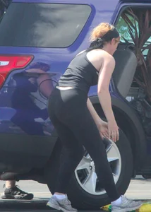 Redhead milf with a nice ass and vtl in leggings while loading her car