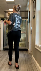 Perky blonde hottie in tight black leggings getting some ice cream