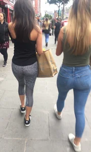 Sexy girl walking in grey patterned leggings with friend in tight jeans