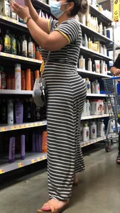 Beautiful Latina with amazing body in long dress