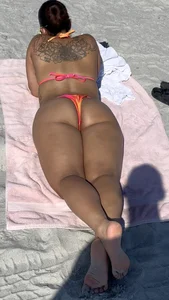 Beautiful Latina body in bikini at beach. Sexy soles too