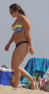 Thick girl on the beach in a bikini