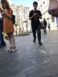 Cute Teen Girl in a Dress With Slim Legs Standing in the Subway Train, Then Crossing the Street Photo Gallery