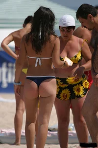 Beach voyeur girls in bikinis, thongs and topless