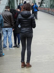 Cute petite girl in tight black jeans