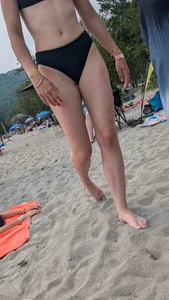 beautiful tight brunette hair girl in black bikini. OC