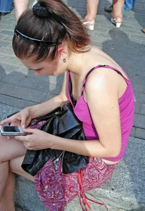 Skinny Girl Sitting on a Step of a Stairs Small Breast Downblouse Photo