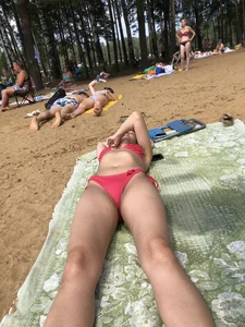 Series of Photos of Sexy Girls in Swimsuits Lying on a Beach With Slightly Spread Legs