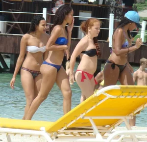 Amazing ebony ass in blue bikini with other sexy friends in bikinis