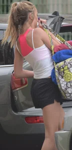 Girl with Hot Thin Legs in Shorts Pitting Stuff into Her Car Candid Gallery