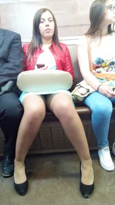 Girl in Pantyhose and a Skirt in Subway Busted the Candid Photographer