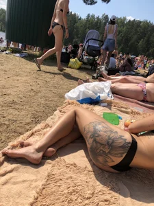 Gorgeous Candid Girl With a Large Tattoo on Her Butt Lying on the Beach Creepshot