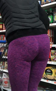 Milf shopping with a nice ass in purple leggings