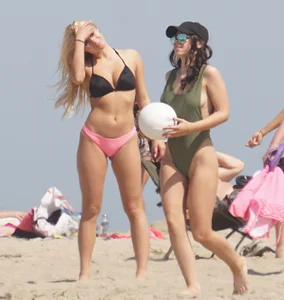 Hot Girls in Swimsuits Playing Volleyball on Sand at the Beach Hot Pics
