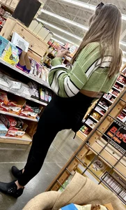 Great ass on this cutie with bangs, bending over and squatting down