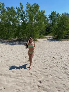 Sexy Girl in a Swimsuit at the Beach