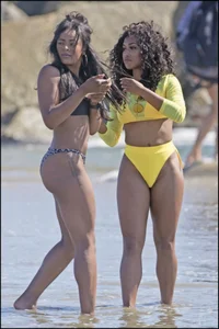 2 amazing candid black girls at the beach in thong bikinis with perfect asses
