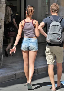 Beautiful teen out with boyfriend in short jean shorts