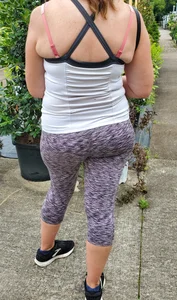 Milf booty in tight leggings shopping for plants